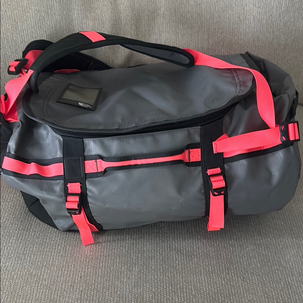 The North Face Base Camp Duffel Size Small 50 L. Gray and Pink Duffel Backpack